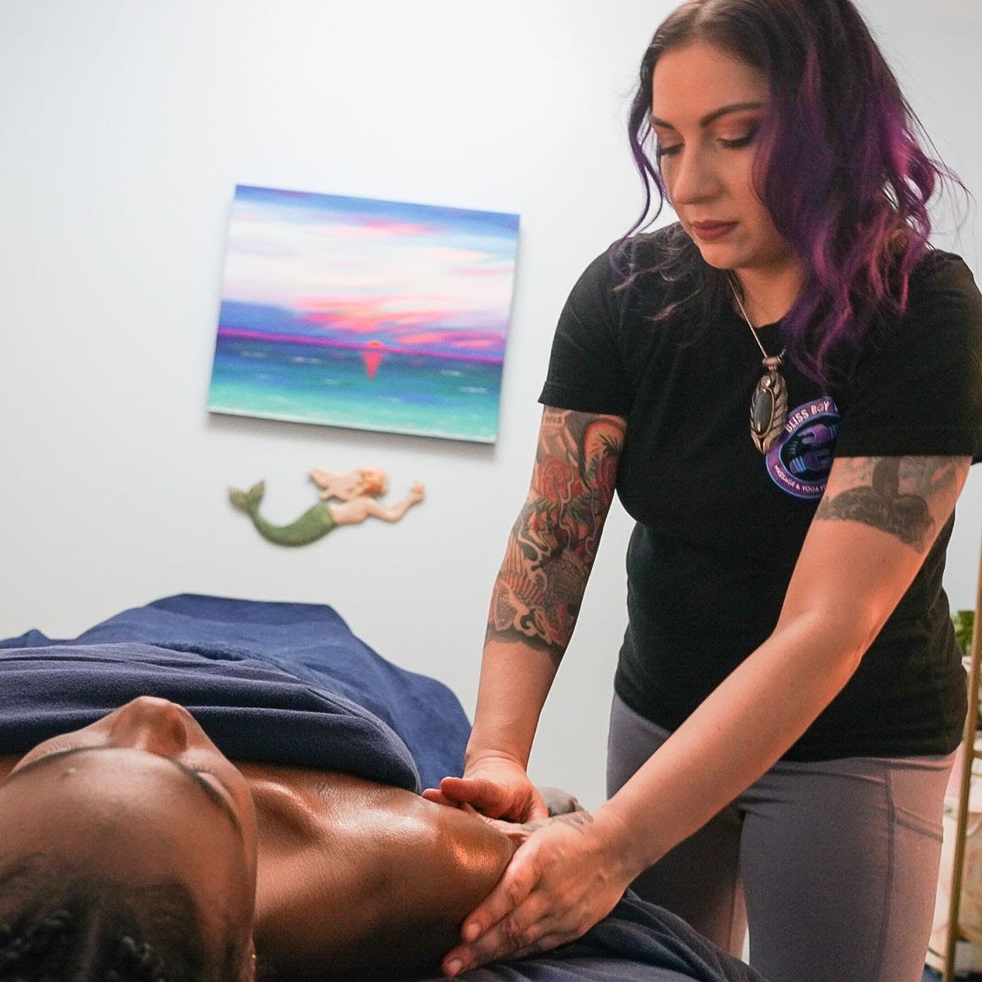 Alexis Thomas giving a massage at The Studio