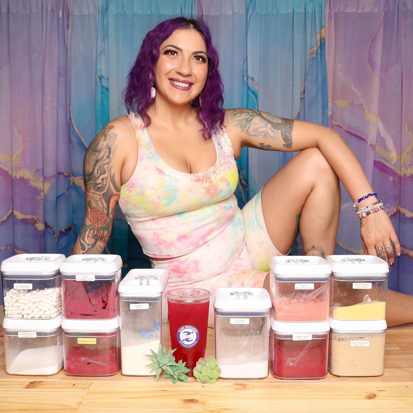 Alexis with the Bliss Nutrition tea jars